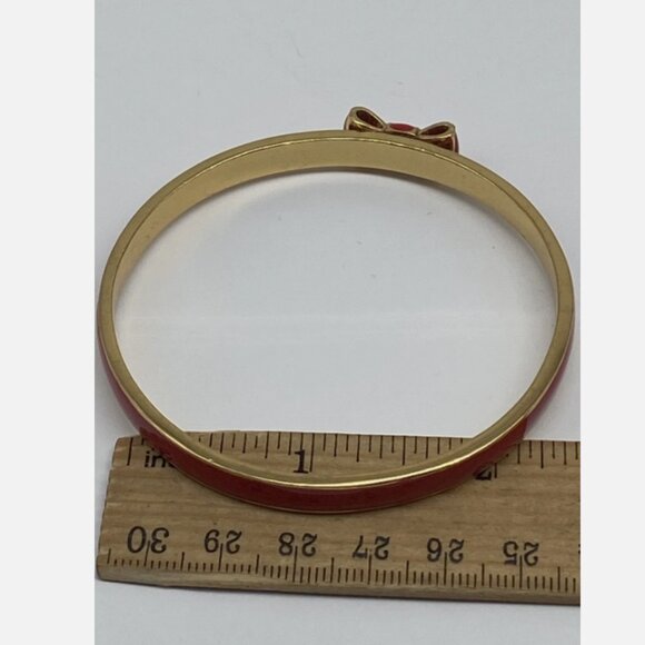 Kate Spade gold Tone Red Enamel Bow 2 7/8" Bangle Bracelet - Picture 5 of 5